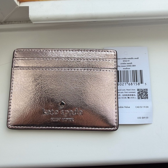 kate spade Handbags - Kate Spade Metallic Rose Card Holder